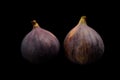 Two figs on black Royalty Free Stock Photo
