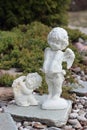 Two Figure of Cupid on a stones