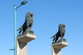 Two figures of lions looking forward on the stone bridge downtown in Zaragoza, Aragon, Spain Royalty Free Stock Photo