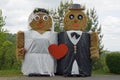 Two figures made out of straw bales, marriage Royalty Free Stock Photo