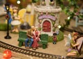 Two figurine lovers kissing under Happily ever after fairytale sign