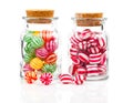 Two filled glass candy jars