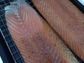 Two fillets of homemade smoked salmon Royalty Free Stock Photo