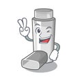 Two finger asthma inhalers in cartoon medicine box