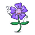 Two finger periwinkle flower character cartoon Royalty Free Stock Photo