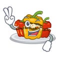 Two finger stuffed pepper is served cartoon plate Royalty Free Stock Photo