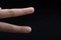 Two fingers of a human hand partly seen in view Royalty Free Stock Photo