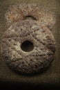 Two finnish traditional round ray bread on sackcloth