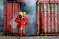 Two firefighter men run out from room cover with huge smoke after fire occur inside the building