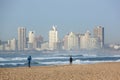 Two Fishermen on Durban Beach with Hotels in Background