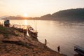 Two fishermen with fishing nets in the Mekong River at sunset. S Royalty Free Stock Photo