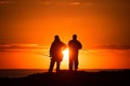 TWO FISHERMEN AT SUNRISE Royalty Free Stock Photo