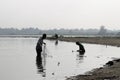 Two fishermen on Taungthaman Lake in the morning Royalty Free Stock Photo