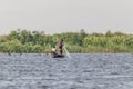 Two fishermen on their boat at Murchison Falls National Park.