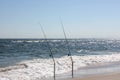 Two fishing poles on the beach Royalty Free Stock Photo