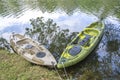 Two fishing single seat kayak on the river Royalty Free Stock Photo