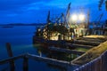 Old Fishing Boats in Harbor at Nighttime