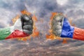 Two fist with the flag of Palestine and Russia faced at each other