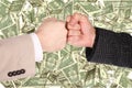 Two fists gesture on dollar background collage Royalty Free Stock Photo