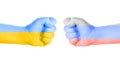 two fists in national colors of Ukraine and Russia