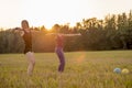 Two fit young women working out with dumbbells standing in the m Royalty Free Stock Photo