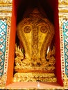 Two Five head nagas at the side of The Royal Pantheon in Temple of The Emerald Buddha Wat Phra Kaew, Bangkok, Thailand