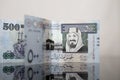 Two five hundred Saudi Riyal notes on Dark Glass Royalty Free Stock Photo