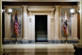 Two flags in hallway