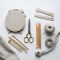 Two flat, beige pattern cutting tools and a tape measure positioned nearby Royalty Free Stock Photo