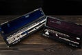 Two flutes in a case on a wooden surface Royalty Free Stock Photo