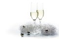 Two flutes champagne glasses for new year and silver decoration