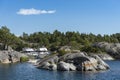 Two flybridge yachts moored to cliff Stockholm archipelago Royalty Free Stock Photo