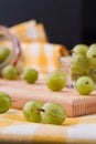 Two focused green cherry-plums.