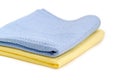 Two folded blue and yellow waffle towels closeup