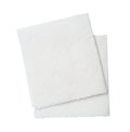 Two folded pieces of white tissue paper or napkin in stack tidily prepared for use in toilet or restroom isolated on white Royalty Free Stock Photo