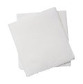 Two folded pieces of white tissue paper or napkin in stack tidily prepared for use in toilet or restroom isolated on white Royalty Free Stock Photo