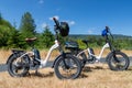 Two Folding Electric Bicycles Along the Centennial Trail