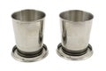 Two folding metal cup on white Royalty Free Stock Photo