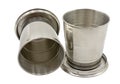 Two folding metal cup on white Royalty Free Stock Photo