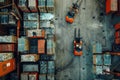 Two forklifts are seen moving pallets of goods inside a warehouse in this aerial view, Forklifts moving pallets of goods Royalty Free Stock Photo