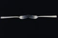 Two forks isolated on black background Royalty Free Stock Photo