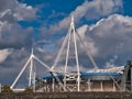 Two of the four white cable-stayed truss masts at the Cardiff Millennium / Principality Stadium in Cardiff, Wales, UK