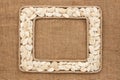 Two frame made of rope with pumpkin seeds on sackcloth