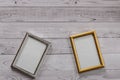 Two frames for photos on a light, vintage wooden background Royalty Free Stock Photo