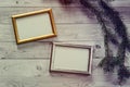 Two frames for photos on a light, vintage wooden background Royalty Free Stock Photo