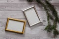 Two frames for photos on a light, vintage wooden background Royalty Free Stock Photo