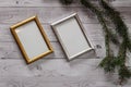 Two frames for photos on a light, vintage wooden background Royalty Free Stock Photo