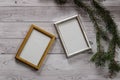 Two frames for photos on a light, vintage wooden background Royalty Free Stock Photo