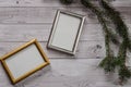 Two frames for photos on a light, vintage wooden background Royalty Free Stock Photo