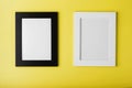 Two frames White and black photo frame on yellow background with free space. Royalty Free Stock Photo